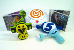 lithefider:  My 4 finnished plush pieces for the OhNo!Doom gallery’s Button Mashers show  I wanted to do Dreamcast music games!  I picked Jet Grind Radio and Space Channel 5.  I also made little, soft, cartoony Dreamcast with an EXTRA LARGE SWIRL.