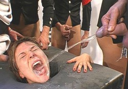 brutal-beast:  Pissing in action!  Bondage and fetish images @  Art of Bondage