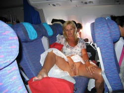 exposed-in-public:  Exposed on a flight at http://exposed-in-public.tumblr.com/ thesexualgourmet:  Center aisle…airplane flashing’s always a little bold  