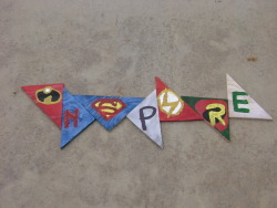 Made it out of wood,paint, and some superhero logos. I&rsquo;d probably go crazy without art.