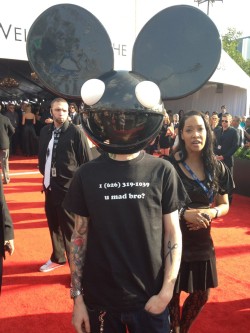 alexmayo:  Grammys: “Maximum trolling achieved”: Deadmau5 showed up at the Grammys wearing Skrillex’s personal cellphone number on his T-shirt. 