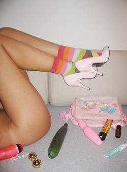 jessicapresley:  There’s something really playful and sexy about this. And I love her socks and shoes! :-)