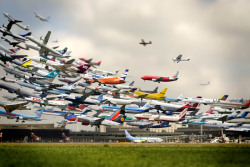 photojojo:  Korean photographer Ho-Yeol Ryu made this digital multiple exposure of planes taking off at Hannover, an airport in Germany. It’s one of those project ideas that takes a lot of time but pays off in the end. Multiple Exposure of Planes