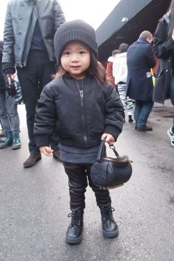 bowieandbalmain:  Alexander Wang’s niece at the AW’12 show with a miniature Wang bag! She is beautiful. 