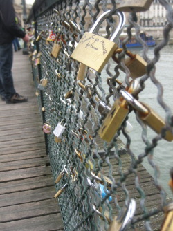 b-e-a-u-t-i-f-u-l-l-y-imperfect:   This is a bridge in Paris. You hang locks on it with the name of you &amp; your boyfriend/girlfriend/best-friend then throw the key into the river. So even though the friend/relationship may end, you can’t remove the