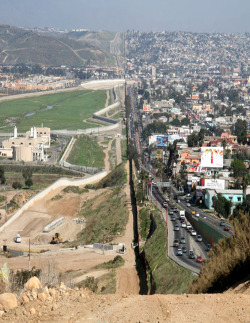 crwmoto84:  neervana:  scaleybark:  U.S.-Mexico Border  literally the coolest picture ive seen on this site  I like mexico better in this picture..my more land to ride my dirtbike and go 4x4