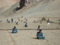  Students sitting for an exam in Afghanistan.