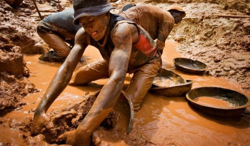 Making a living in the mines of Africa. From New York Times - photo credit to Finbarr O'Reilly/Reuters