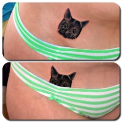 fuckyeahtattoos:  My second tattoo. My peek-a-boo kitty! (^-^) This was a very spontaneous tattoo. I just thought one day, “Hey! Why the heck not get a kitty by my ‘kitty’?”! Lol No regrets, probably cuz I love cats in general. Woot woot, cat