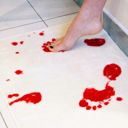 goldcoastfamily:  damn-the-jam:  loveissuchalovelytorture:   shark-bones:   Bath mat turns red when wet.  I need towels made out of this, and then I’d make my guests use them with out telling them. Then wait for the screams of terror.   Calm down there,