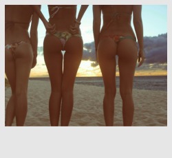 young-thong-bikini:  Three young teen girls in thong bikini walking the beach.