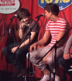 larrysis:  golarryorgohome:  tardisol:  larryfoolishlyinlove:  malikspaynecakes:  THIS IS SO FUCKING CUTE  I could stare at this gif forever  HES LIKE A LITTLE KITTEN AND WHEN YOU SWAT AT A KITTEN PLAYFULLY IT SWATS BACK A BIT ROUGH BUT THEN GETS ALL