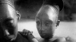 spacegod:  The Mangbetu tribe, Congo. Babies soft heads were wrapped tightly with cloth to create an elongated appearance as the skull hardened. This was to please the gods, who were obviously space aliens. Due to westernization the practice died out