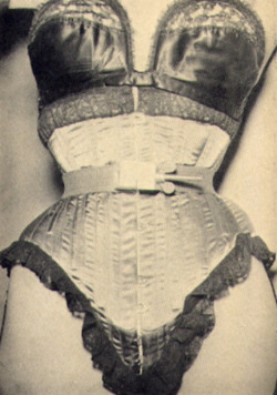 stfumadison:  Corset with metal waist cinch, screw and wingnut from Exotique Magazine, c. 1950s 