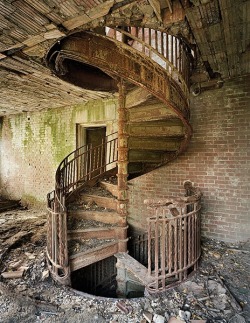 Rustic old spiral stairs.