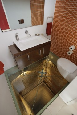 timelordy-teganbreann:  hurpaderp:  thearchtivist:  Bathroom with glass floor, overlooking a 15 story elevator shaft.     