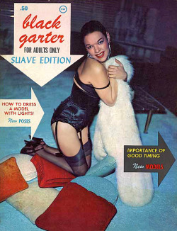 burleskateer:    Tana Louise adorns some of her blackest lingerie for the cover shoot of ‘Black Garter’ magazine: the ‘SUAVE EDITION’..   