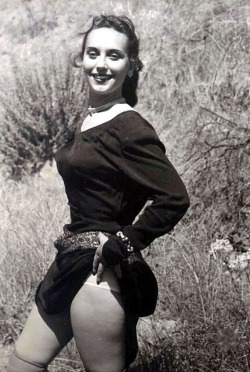 Venus The Body (aka. Jean Smyle) flashes her panties in this 50&rsquo;s-era candid photo from an outdoor shoot.. Likely for publication in one of the many &ldquo;Artist&rsquo;s Models&rdquo; pocket digests, being produced at that time..