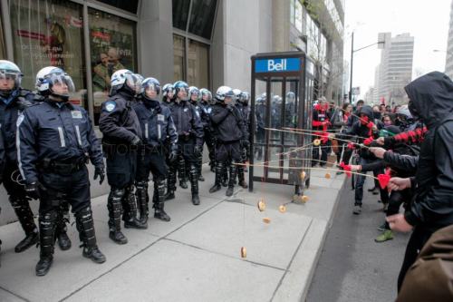codys-so-mpreg:  sasscrackers:  platosatlantis:  Montreal student protesters baiting riot police with donuts.  aaaaand heres canada  omfg  O CANADATIM HORTONS, POUTINE, GEESEMAAAAPLE FUCKING SYRUUUUUPAND BEAVERS, FRENCH AND MOOSE MEESE WE ARE SO POLITEYOU