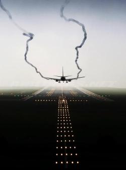 furples:  Plane coming in to land with vapor trails (by Murray) 