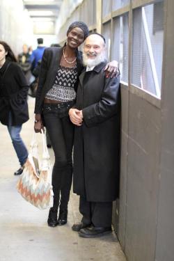 aboutmaleprivilege:  tw: harassment madamethursday:  [Image: A picture of a tall, very thin Black woman with her shoulder over a shorter, older white man wearing traditional Orthodox Jewish clothing on a New York sideway.] staghunts:  “This one is very