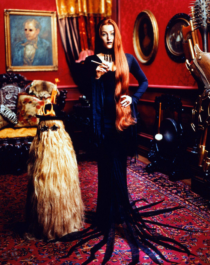 lost-carcosa:Gillian Anderson as Morticia Addams. Photographed by Mark Seliger for