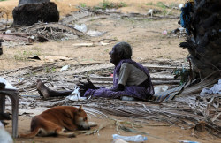 leptiir:  picturesofwar:  “An elderly Sri Lankan Tamil sits among the rubble of a village near Puthukkudiyiruppu on April 24, 2009.” (PEDRO UGARTE/AFP/Getty Images)  It’s very sad how the Tamil minority is totally ignored by the media, the only