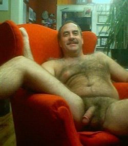 daddysbottom:  I was going to sneak up to dad and snap a photo of him reclining nude in his chair while watching tv in the den. But he caught me (that damn cat!) . However, instead of getting mad, dad actually smiled when he realized what I was about