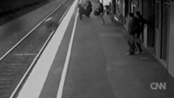 imyourbadkarma:   wild-nigglets:  i watched this on the news, it was in melbourne in 2009, it’s about a lady that was waiting for the train, and she had her baby in a pram, and as the train was coming the pram rolled onto the tracks, the lady closest
