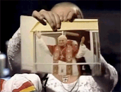 Sinead O’Connor rips a picture of the Pope John Paul II to