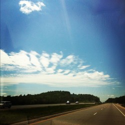 On the road. Awesome clouds. Beautiful weather.
