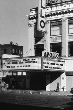  Exterior view of the Apollo Theater at 125th Street in Harlem. KRS One &amp; Boogie Down Productions with Rob Base are featured are the marquee. (1988)