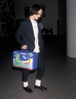 little-trouble-grrrl:  Winona Ryder in 1990 + dinosaur suitcase 