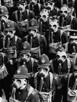 itsjohnsen:  London policemen wear gas masks for a training drill,