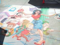 comicbookwomen:  This is from the Chalk Festival in LA(or Hollywood…). My friend attended and took several pictures, the top is hers. The second pic is the complete image which is now floating on Facebook. It was one of the Winners. Artist name is