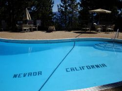 laezi:  allhailmeenah:  foxbabies:  rvndy:  hugsandhairtugs:  At the Cal-Neva Lodge in Lake Tahoe, the Nevada/California state line actually runs through the swimming pool. Fun fact: Cal-Neva was once co-owned by Frank Sinatra.  This is cool as fuck cause