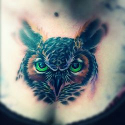 fuckyeahtattoos:  I just recently got this owl chest piece, its not finished yet. It will have two roses and the wings…but the face itself is pretty surreal i couldnt be anymore happy. When it is all said and done and i get it finished; The roses resemble