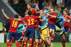 sadowa:  Cesc Fabregas celebrates scoring the winning penalty kick with teammates at the end of Spain’s Euro 2012 semifinal victory over Portugal Wednesday in Donetsk, Ukraine. Spain Stands One Win From Immortality The victory maintains Spain’s run