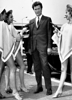 theswinginsixties:  Clint Eastwood arrives at the airport to promote ‘A Fistful of Dollars’ in London, 1967. 