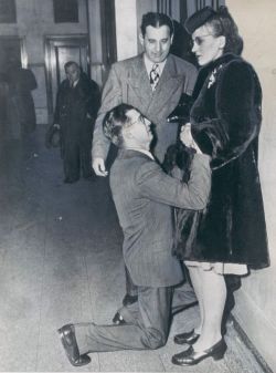  A man begging his wife’s forgiveness inside Divorce Court, 1948, Chicago.   