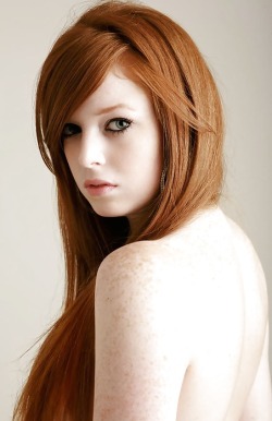 Freckled redhead portrait.