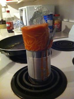 mooflakes:  handgrenade2:  So it turns out that just sticking a can of spaghetti on the stove to heat it up  does not work the same way as doing it over a campfire. It rose, in cylinder form, and then when I shut the heat off, it sunk back down. Who