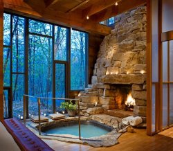 mindofdaddy:  A hot tub in the floor in front of a stacked stone fireplace.  Yeah, definitely adding this to the list of design ideas for my future private mountain retreat :)  Daddy and I definitely deserve this&hellip;oh, sweet retreat!
