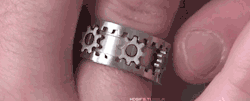 drillbot:  redfemhoovy:  angerismyshieldandsword:  hdgifs:  Gear Ring  I would enjoy this.  OoooOO! *u*  and then you got one of your knuckle hairs caught in the gears and died