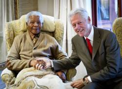 Nelson Mandela, Bill Clinton. Mandela turned