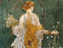 noiseman:  Flora, woman picking flowers with a cornucopia in the ruins of Pompeii,  1-45  AD.   