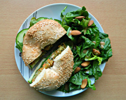 findmeunderneath:  seedsnsmiles:  -Toasted sesame seed bagel with hummus, courgette, spinach, nut cutlet and sweet chill sauce and a romaine &amp; almond salad with a ginger/sesame dressing.  This sounds REALLY good… 