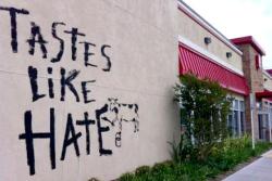 This was spray painted onto a wall of a Chick-Fil-A.