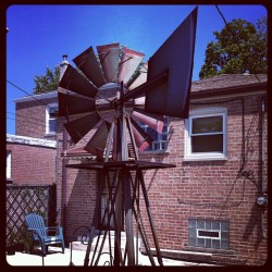 My auntie has a windmill in her backyard. #instaphoto #windmill #metalworks (Taken with Instagram)