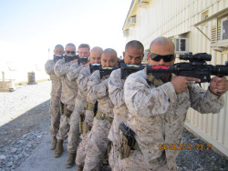 gabeweb:  U.S. Marine’s With Gun Staches  Here’s a pretty awesome picture of U.S. Marines sporting mustache (moustache) stickers on their guns. The “gunstache” has officially been born. Support Our Marines Here’s a list of some charities that